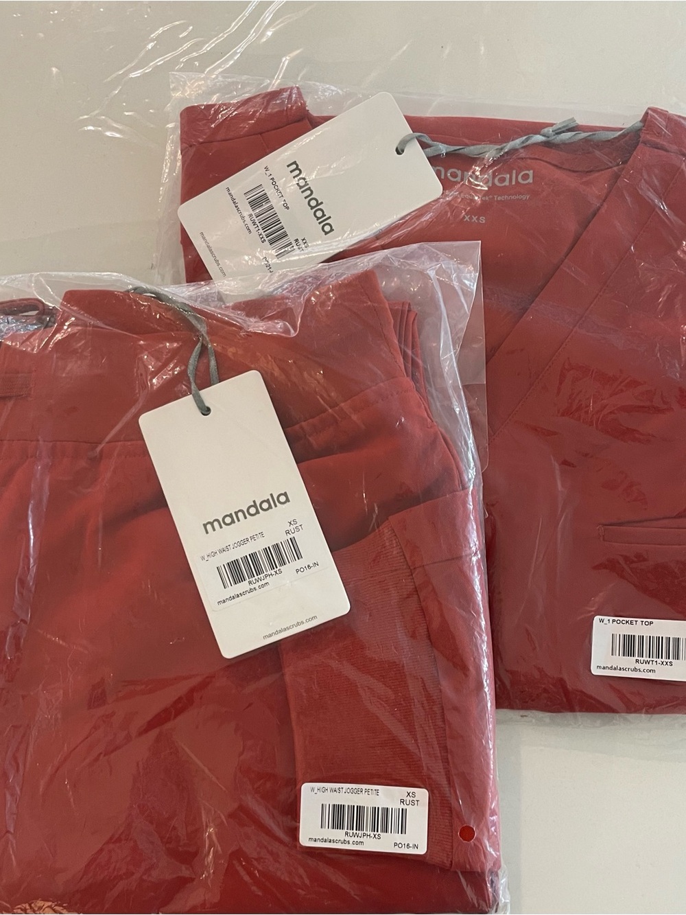 Mandala Rust Red Scrub Top - Packaged